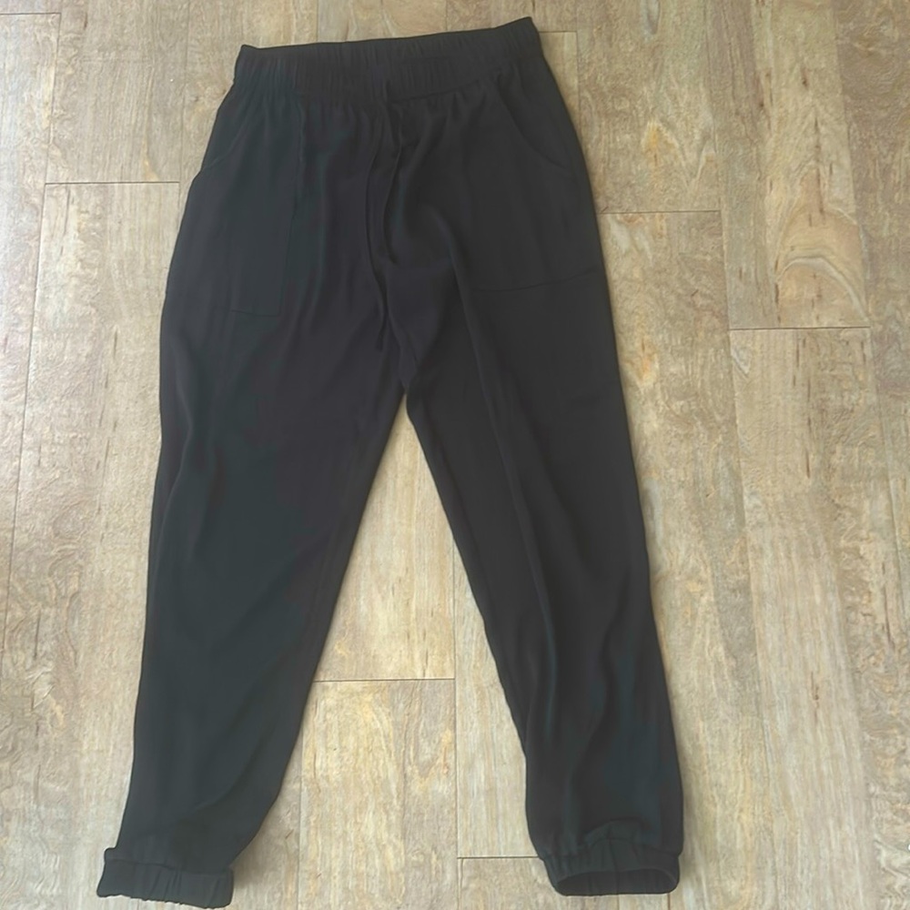 Silky black drawstring and elastic waist and jogger style pants, loose/light